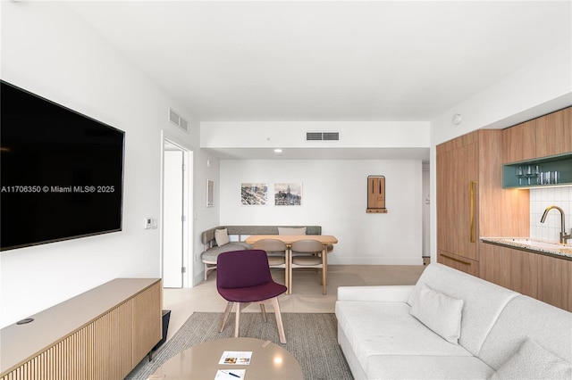 living room with sink