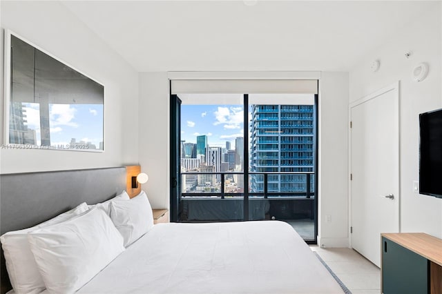 bedroom with light tile patterned floors