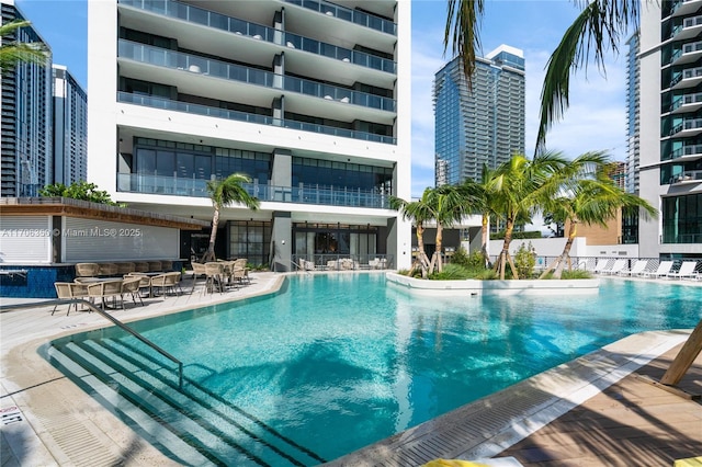 view of pool featuring a patio