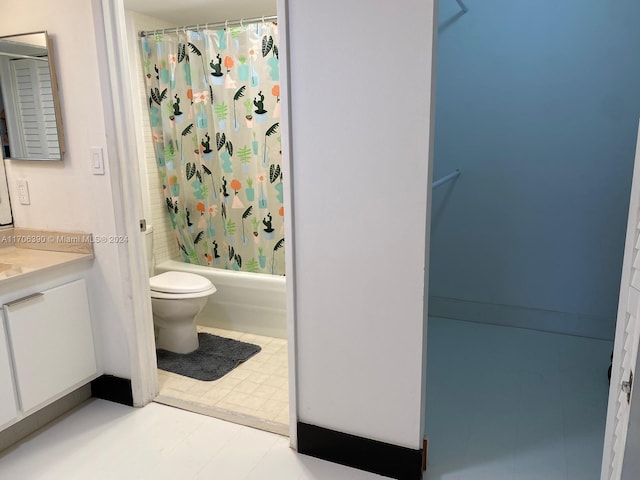 full bathroom with tile patterned floors, vanity, toilet, and shower / bathtub combination with curtain