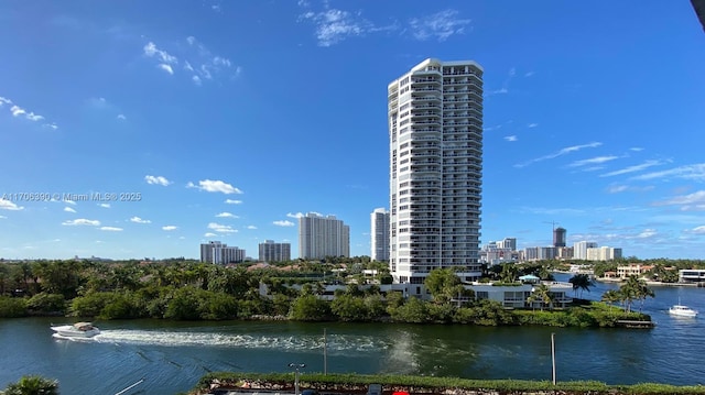 property's view of city featuring a water view