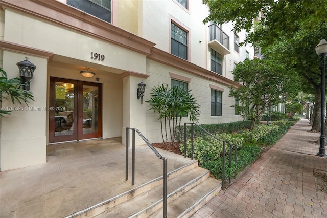 entrance to property featuring french doors