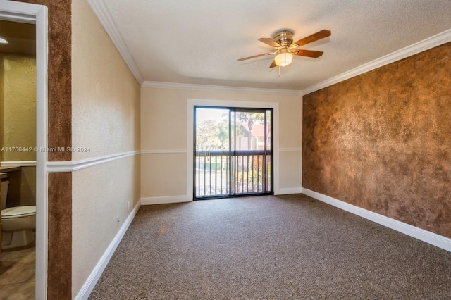 carpeted spare room with a textured ceiling, ceiling fan, and ornamental molding