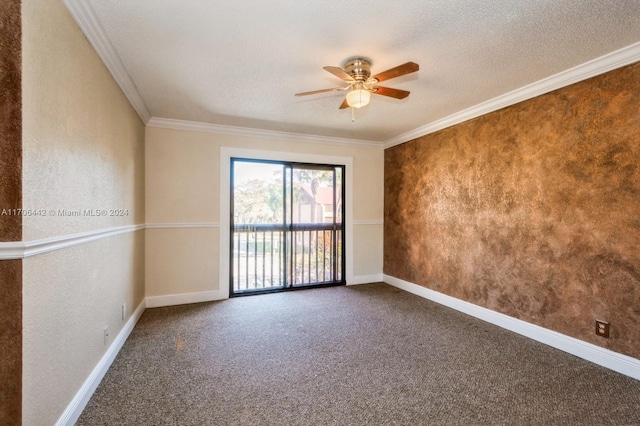 carpeted spare room featuring a textured ceiling, ceiling fan, and crown molding