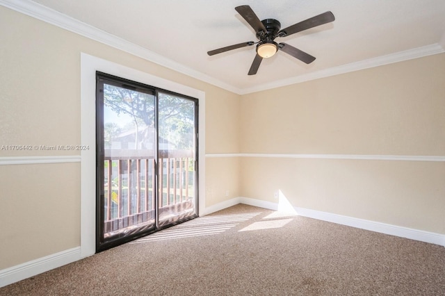 carpeted spare room featuring ceiling fan and crown molding