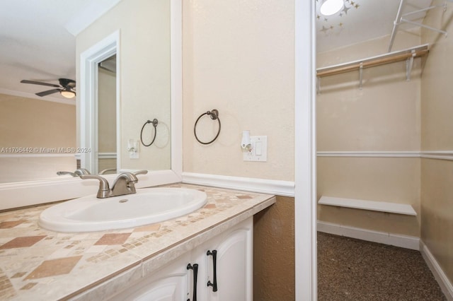 bathroom featuring vanity and ceiling fan