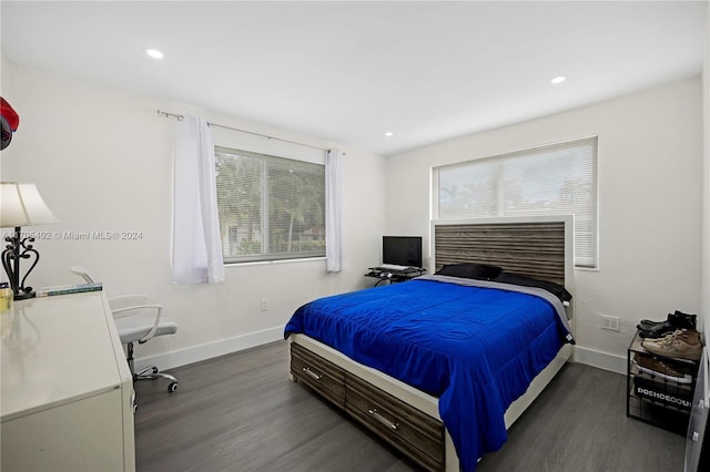 bedroom featuring dark wood-type flooring