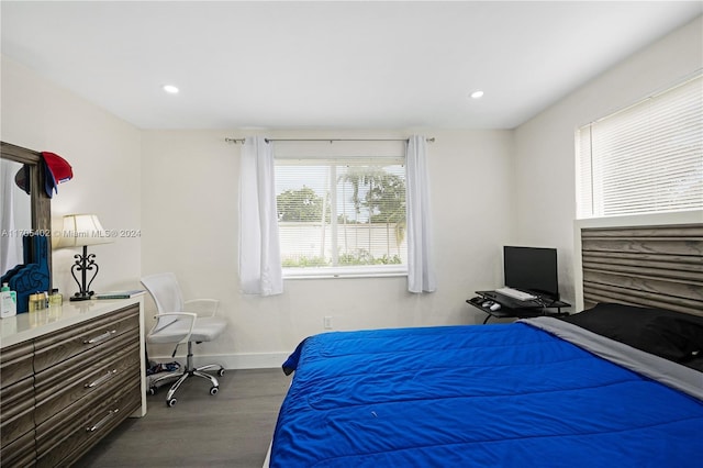 bedroom with wood-type flooring