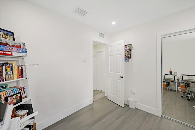 hallway featuring light wood-type flooring