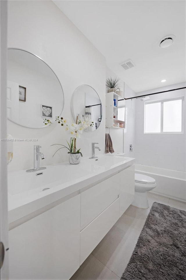 full bathroom featuring tile patterned floors, shower / tub combination, vanity, and toilet