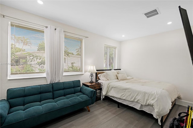 bedroom featuring hardwood / wood-style flooring