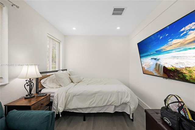 bedroom featuring wood-type flooring