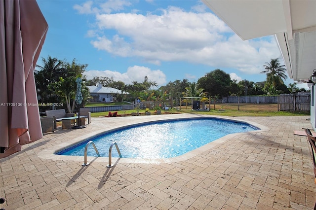 view of pool with a patio