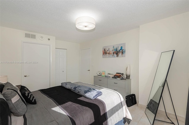 bedroom with a textured ceiling