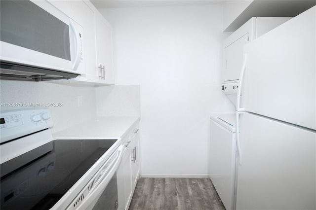 kitchen featuring light hardwood / wood-style flooring, white cabinets, and white appliances