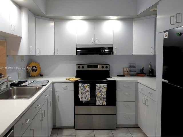 kitchen with white cabinets, black refrigerator, electric stove, sink, and extractor fan