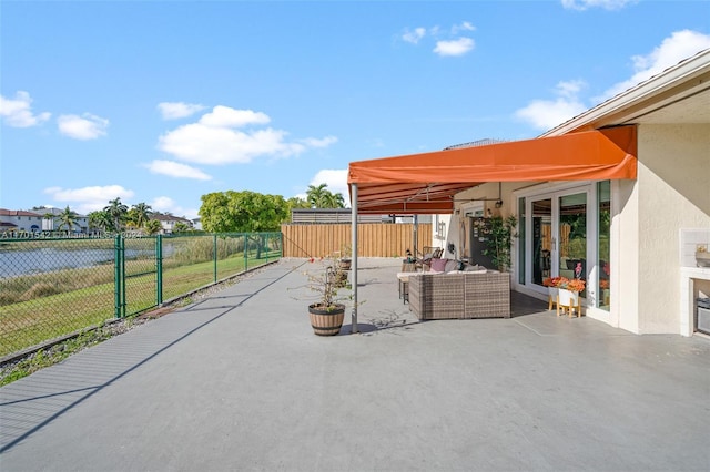 view of patio / terrace featuring a water view