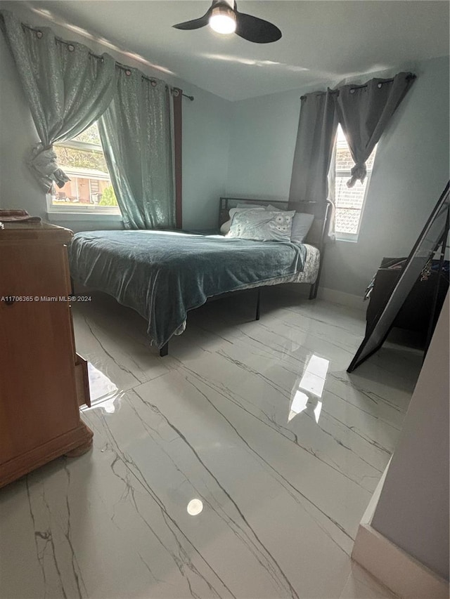 bedroom featuring ceiling fan