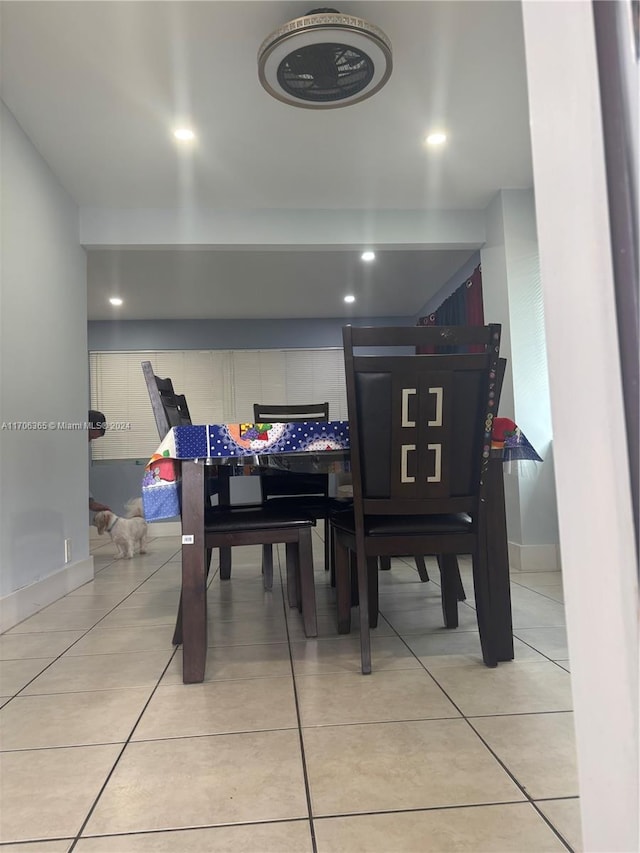 dining area with light tile patterned floors