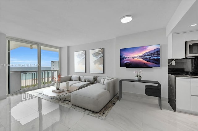 living room with a wall of windows