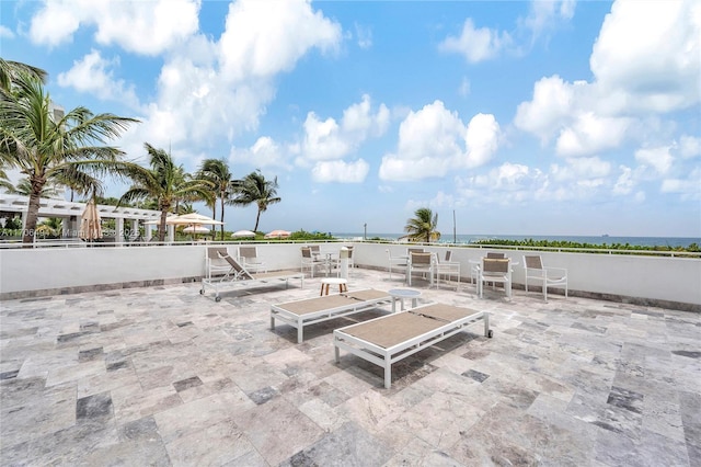 view of patio / terrace with a water view