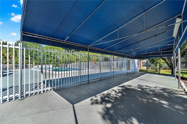 view of pool featuring a patio, fence, and a fenced in pool