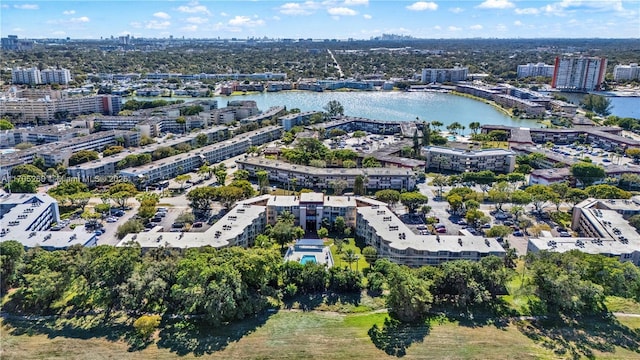 aerial view featuring a water view and a view of city