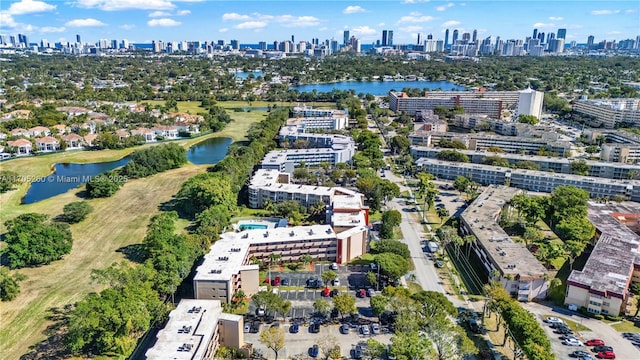 aerial view featuring a water view and a city view