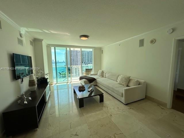 31 SE 5th St Unit 1908, Miami, FL 33131 - living area with ornamental molding, a textured ceiling, light marble finish floors, and floor to ceiling windows