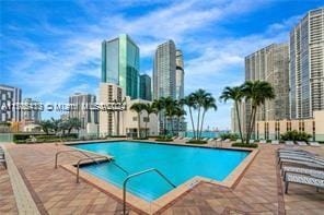31 SE 5th St Unit 1908, Miami, FL 33131 - community pool with a skyline view