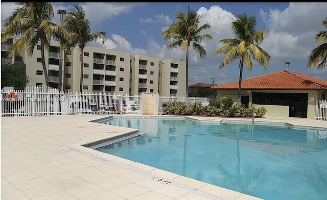 view of pool featuring a patio area