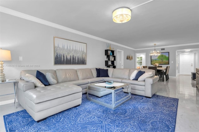 living room with a notable chandelier and crown molding