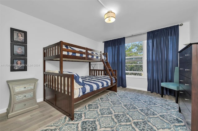 821 Cypress Blvd Unit 304, Pompano Beach, FL 33069 - bedroom with wood finished floors and baseboards