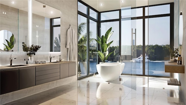 bathroom featuring a bath, vanity, tasteful backsplash, and floor to ceiling windows