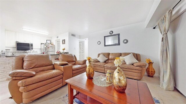 10421 SW 157th Pl Unit 206, Miami, FL 33196 - living area featuring visible vents