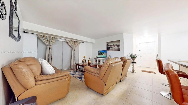 living room featuring light tile patterned floors