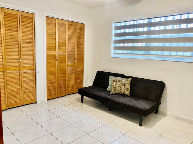 sitting room featuring light tile patterned floors