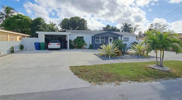 manufactured / mobile home featuring a carport