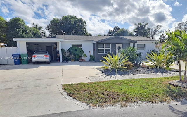 view of front of house with a carport