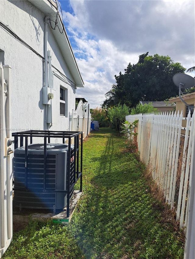 view of yard featuring central AC