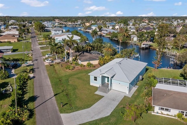 drone / aerial view with a water view