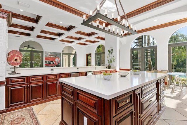 kitchen with a center island, coffered ceiling, french doors, beam ceiling, and a chandelier