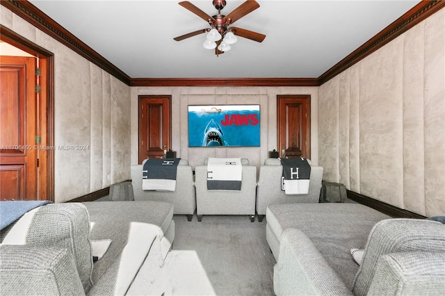 living room featuring carpet flooring, ceiling fan, washer / dryer, and ornamental molding