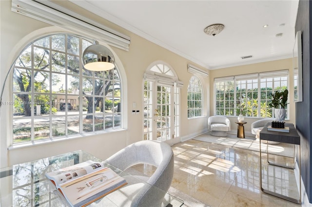 sunroom featuring visible vents