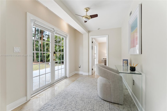 office space with marble finish floor, ceiling fan, baseboards, and french doors