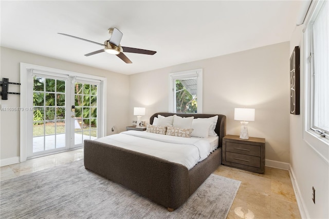 bedroom featuring access to exterior, ceiling fan, baseboards, and french doors