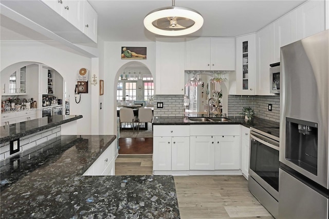 kitchen featuring white cabinetry, appliances with stainless steel finishes, and sink