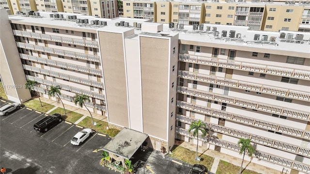 421 NE 14th Ave Unit 203, Hallandale Beach, FL 33009 - view of apartment building / complex with uncovered parking