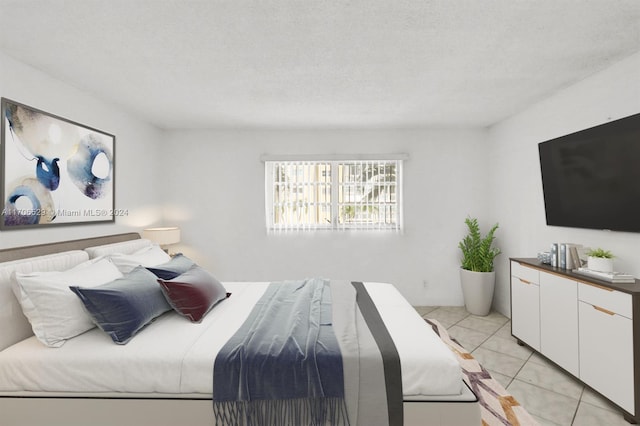 421 NE 14th Ave Unit 203, Hallandale Beach, FL 33009 - bedroom with light tile patterned floors