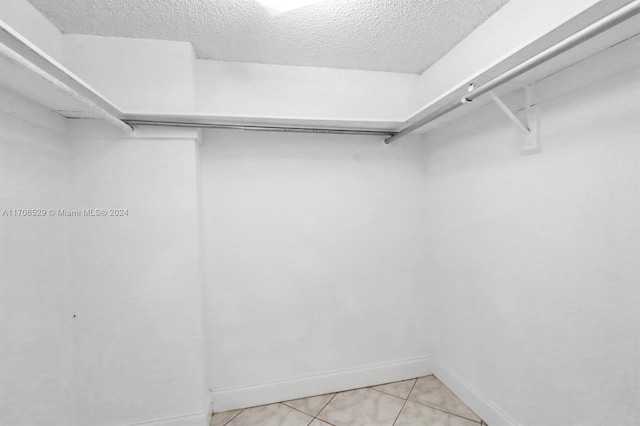 421 NE 14th Ave Unit 203, Hallandale Beach, FL 33009 - spacious closet featuring light tile patterned floors